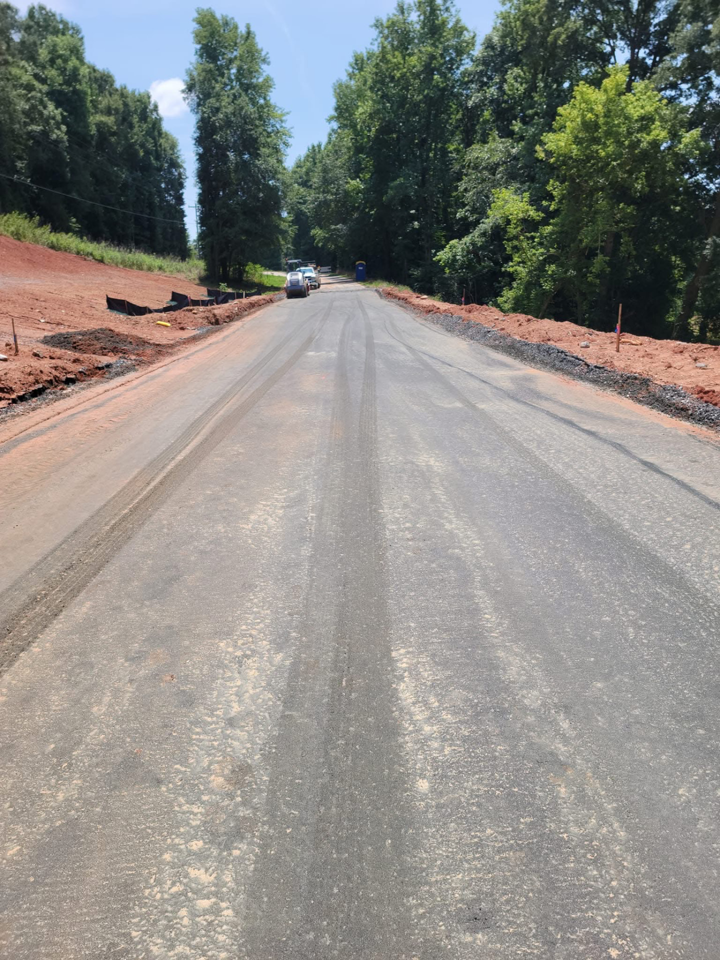Prepared roadway base through a wooded Georgia property